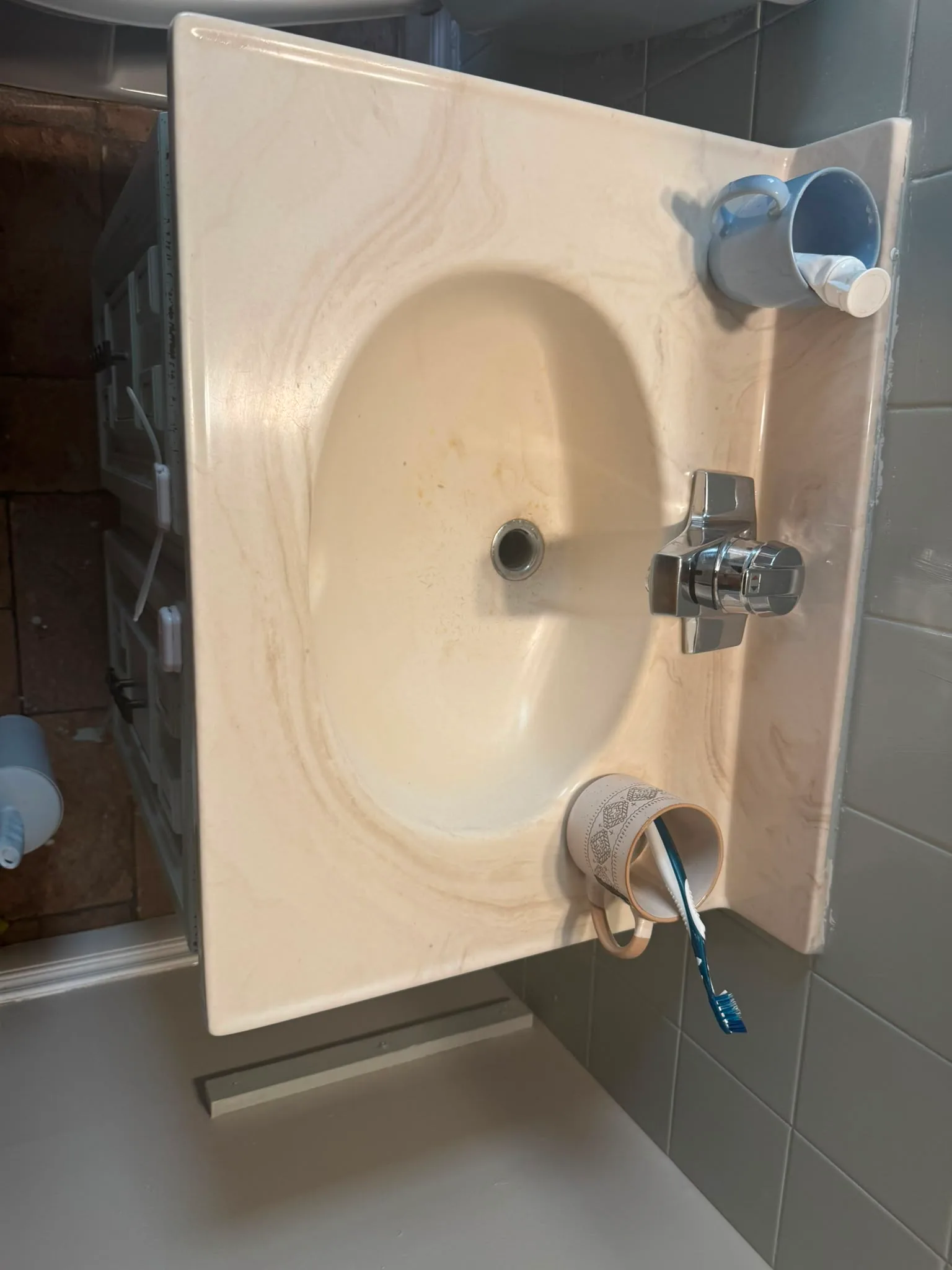 Bathroom vanity and sink cleaning before and after, after